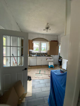 After one coat of white paint in the kitchen design project