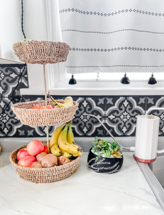 Epoxy resin countertop with marbling and hand painted succulent bowl planter, tiered kitchen organizer, and geometric watering can