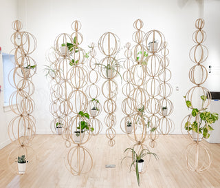 Bamboo trellis in gallery with plants handmade natural boho decor