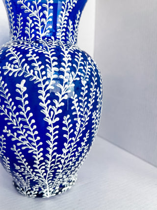blue icey ice traditional decor trad design blue and white floral milk glass vintage upcycled upcycle hand-painted one-of-a-kind terracotta self-watering waterer plant solutions small business woman-owned gardening indoors ferns keep plants alive beautiful unique plant planter pots gifts coquette maximalist decor handmade chinoiserie blue Chinese ceramics pottery botanical regency Bridgerton duchess Daphne classy timeless gifts vase upcycled 