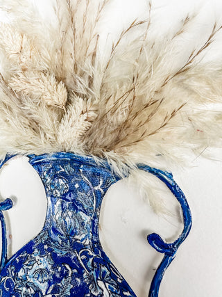 Blue and white floral-patterned vase with pink and blue feathers on a white background dried pink flowers ceramic vase on a white background curved leaf hand-drawn hand-painted print art prints affordable artwork artist made painted accents canvas paper blue & white ceramics chinoiserie vases ginger jar traditional decor Unframed Chinese pottery floral design trad grand millennial watercolor paper ready to frame elegance pink floral dried pampas