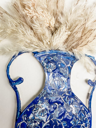 Blue and white floral-patterned vase with pink and blue feathers on a white background dried pink flowers ceramic vase on a white background curved leaf hand-drawn hand-painted print art prints affordable artwork artist made painted accents canvas paper blue & white ceramics chinoiserie vases ginger jar traditional decor Unframed Chinese pottery floral design trad grand millennial watercolor paper ready to frame elegance pink floral dried